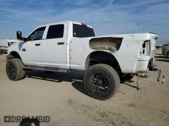 2012 Ram 2500 ST with VIN 3C6UD5CL0CG334674, listed as a Copart auction lot 42575255 with 157,405 mi miles and Salvage Title. Bid and sale history available at carsss.com. Image 2.