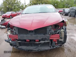 2014 Lincoln MKZ Hybrid z VIN 3LN6L2LU7ER811633, wystawiony jako IAAI lot #41870485 z przebiegiem 203 692 mil mil oraz . Historia ofert i sprzedaży dostępna na DreamBid. Obrazek 6.