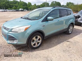 2013 Ford Escape SE with VIN 1FMCU9G99DUA86154, listed as a IAAI auction lot 42471002 with 168,075 mi miles and . Bid and sale history available at DreamBid. Image 2.
