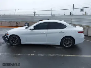 2019 Alfa Romeo Giulia with VIN ZARFAMANXK7600498, listed as a IAAI auction lot 41777643 with 100,492 mi miles. Bid and sale history available at carsss.com. Image 14.