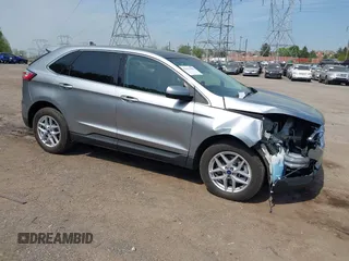 2021 Ford Edge SEL z VIN 2FMPK4J95MBA03957, wystawiony jako IAAI lot #42112282 z przebiegiem 23 075 mil mil oraz . Historia ofert i sprzedaży dostępna na DreamBid. Obrazek 1.