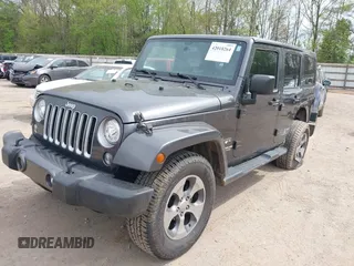 2017 Jeep Wrangler Unlimited Sahara with VIN 1C4BJWEGXHL595724, listed as a IAAI auction lot 42018264 with 95,948 mi miles. Bid and sale history available at carsss.com. Image 19.