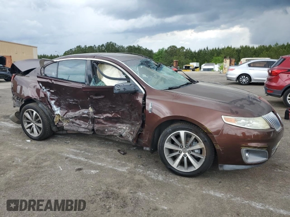 2009 Lincoln MKS z VIN 1LNHM93R89G601548, wystawiony jako Copart lot #54336075 z przebiegiem 318 143 mil mil oraz Szkoda całkowita • Salvage title. Historia ofert i sprzedaży dostępna na DreamBid. Obrazek 4.
