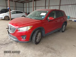 2016 Mazda CX-5 Touring with VIN JM3KE2CY0G0691927, listed as a IAAI auction lot 41611743 with 160,246 mi miles. Bid and sale history available at carsss.com. Image 2.