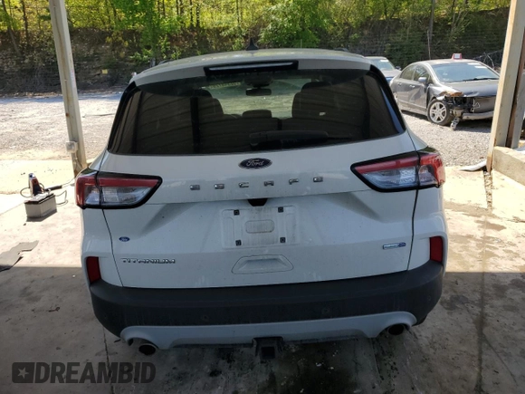 2020 Ford Escape Titanium с VIN 1FMCU9J93LUB38014, выставлен на аукционе Copart как лот 52348725 с пробегом 78 193 миль миль и Списание • Salvage title. История ставок и продаж доступна на DreamBid. Изображение 6.