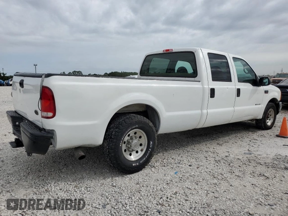 2001 Ford F-350 XL with VIN 3FTSW30F51MA57578, listed as a Copart auction lot 80559194 with 153,985 mi miles and Salvage Title. Bid and sale history available at DreamBid. Image 3.