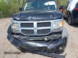 2009 Dodge Nitro SE z VIN 1D8GT28K69W505396, wystawiony jako IAAI lot #42104252 z przebiegiem 144 026 mil mil oraz . Historia ofert i sprzedaży dostępna na DreamBid. Obrazek 6.