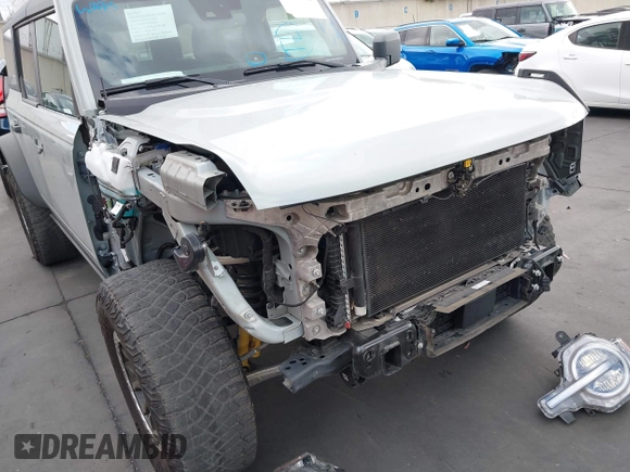 2023 Ford Bronco с VIN 1FMEE5DP0PLA97359, выставлен на аукционе IAAI как лот 42130581 с пробегом 32 335 миль миль и . История ставок и продаж доступна на DreamBid. Изображение 6.