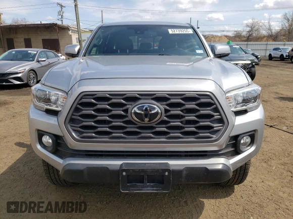 2021 Toyota Tacoma SR z VIN 5TFCZ5AN7MX272231, wystawiony jako Copart lot #52739255 z przebiegiem 67 414 mil mil oraz Szkoda całkowita • Salvage title. Historia ofert i sprzedaży dostępna na DreamBid. Obrazek 5.