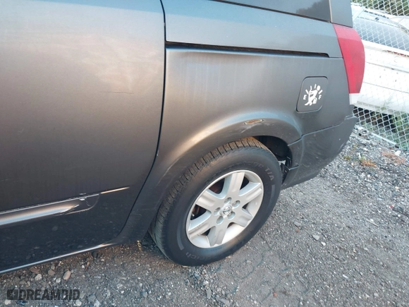 2007 Nissan Quest with VIN 5N1BV28U87N135698, listed as a IAAI auction lot 40550826 with 999,999 mi miles. Bid and sale history available at carsss.com. Image 6.