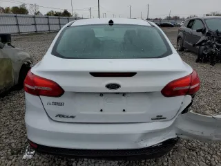 2016 Ford Focus SE with VIN 1FADP3F20GL346345, listed as a Copart auction lot 77115253 with 91,588 mi miles and Salvage Title. Bid and sale history available at DreamBid. Image 6.