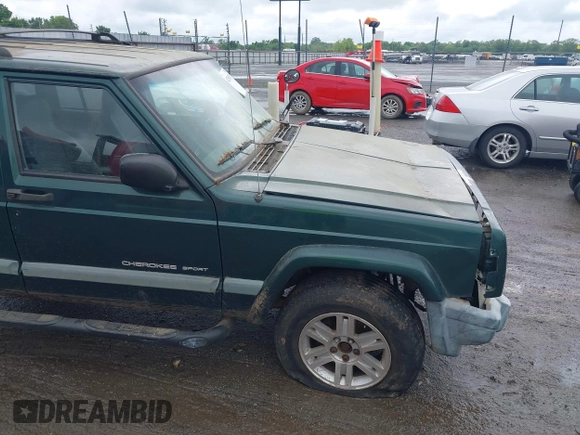 2000 Jeep Cherokee with VIN 1J4FT48S4YL240347, listed as a IAAI auction lot 42361311 with Not provided miles and . Bid and sale history available at DreamBid. Image 11.
