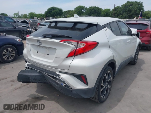 2022 Toyota C-HR XLE z VIN NMTKHMBX2NR144638, wystawiony jako IAAI lot #42063325 z przebiegiem 22 823 mil mil oraz . Historia ofert i sprzedaży dostępna na DreamBid. Obrazek 4.