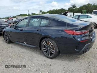 2023 BMW 8 Series 840i with VIN WBAGV2C00PCM91926, listed as a Copart auction lot 59285464 with 1,377 mi miles and Non Repairable. Bid and sale history available at carsss.com. Image 2.