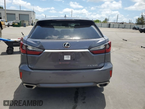 2019 Lexus RX 350 z VIN 2T2ZZMCA1KC134965, wystawiony jako Copart lot #56112715 z przebiegiem 33 944 mil mil oraz Szkoda całkowita • Salvage title. Historia ofert i sprzedaży dostępna na DreamBid. Obrazek 6.