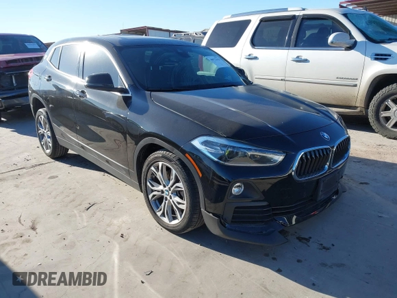2019 BMW X2 sDrive28i with VIN WBXYJ3C50KEP77327, listed as a IAAI auction lot 40922194 with 94,672 mi miles. Bid and sale history available at carsss.com. Image 1.