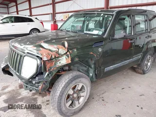 2008 Jeep Liberty Sport with VIN 1J8GN28K98W232003, listed as a IAAI auction lot 42127476 with 129,286 mi miles. Bid and sale history available at carsss.com. Image 6.