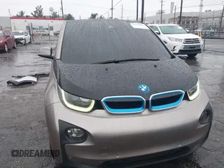 2014 BMW i3 with VIN WBY1Z4C58EV276329, listed as a IAAI auction lot 41570602 with 87,925 mi miles and . Bid and sale history available at DreamBid. Image 6.
