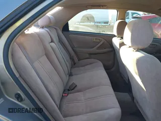 1997 Toyota Camry LE z VIN 4T1BG22K0VU019383, wystawiony jako IAAI lot #41271457 z przebiegiem 175 214 mil mil oraz . Historia ofert i sprzedaży dostępna na DreamBid. Obrazek 8.