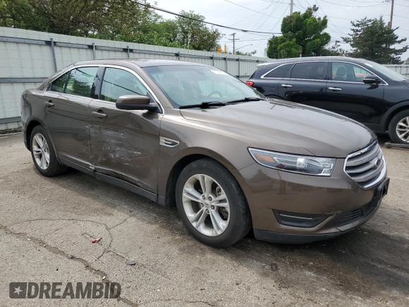 2015 Ford Taurus SEL with VIN 1FAHP2E89FG193926, listed as a Copart auction lot 61036375 with 23,963 mi miles and Salvage title. Bid and sale history available at DreamBid. Image 4.