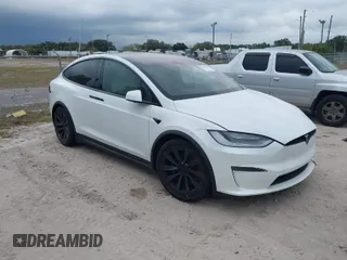 2022 Tesla Model X with VIN 7SAXCBE56NF364067, listed as a IAAI auction lot 40947378 with 1 mi miles. Bid and sale history available at carsss.com. Image 1.