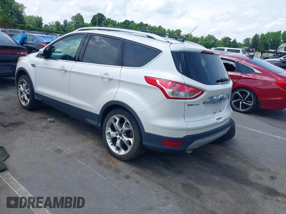 2016 Ford Escape Titanium with VIN 1FMCU9J90GUC48346, listed as a IAAI auction lot 42523307 with 114,265 mi miles and . Bid and sale history available at DreamBid. Image 3.