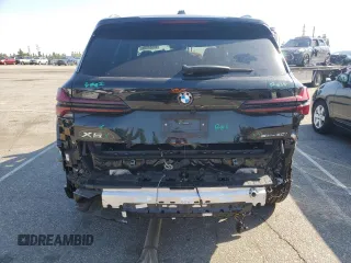 2025 BMW X5 sDrive40i with VIN 5UX13EU05S9W82678, listed as a Copart auction lot 49857255 with 9,901 mi miles and Salvage Title. Bid and sale history available at carsss.com. Image 6.