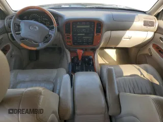 2001 Lexus LX 470 z VIN JTJHT00W213507042, wystawiony jako Copart lot #52634195 z przebiegiem 179 707 mil mil oraz Tytuł czysty. Historia ofert i sprzedaży dostępna na DreamBid. Obrazek 8.