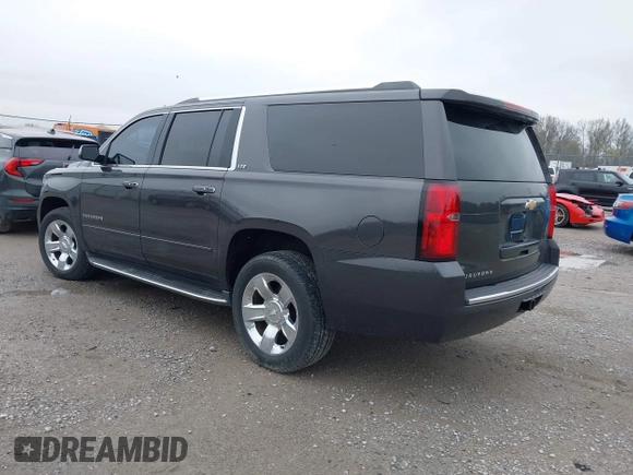 2015 Chevrolet Suburban LTZ with VIN 1GNSKKKC4FR712965, listed as a IAAI auction lot 41928053 with 188,571 mi miles. Bid and sale history available at carsss.com. Image 3.
