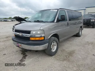 2007 Chevrolet Express Passenger with VIN 1GAHG39U771237121, listed as a Copart auction lot 60245775 with 187,005 mi miles and Salvage title. Bid and sale history available at DreamBid. Image 1.