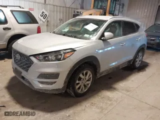 2019 Hyundai Tucson Value with VIN KM8J3CA40KU071883, listed as a IAAI auction lot 41358246 with 57,440 mi miles. Bid and sale history available at carsss.com. Image 2.