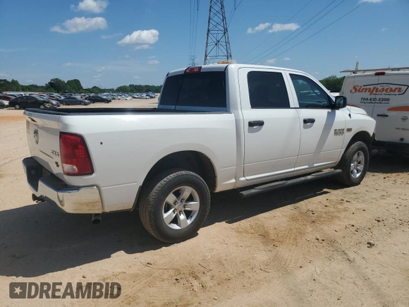 2018 Ram 1500 Tradesman with VIN 3C6RR7KT2JG252561, listed as a Copart auction lot 55558965 with 141,451 mi miles and Salvage title. Bid and sale history available at DreamBid. Image 3.