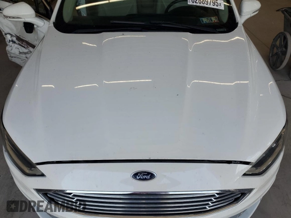 2017 Ford Fusion Hybrid Titanium z VIN 3FA6P0RU3HR400034, wystawiony jako Copart lot #62689795 z przebiegiem 109 118 mil mil oraz Szkoda całkowita • Salvage title. Historia ofert i sprzedaży dostępna na DreamBid. Obrazek 11.