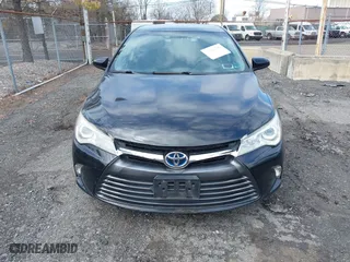 2015 Toyota Camry Hybrid LE with VIN 4T1BD1FK3FU164092, listed as a IAAI auction lot 41886726 with 396,189 mi miles. Bid and sale history available at carsss.com. Image 12.