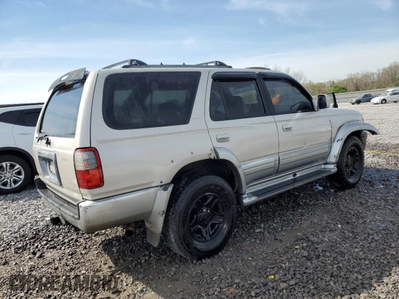 1999 Toyota 4Runner Limited with VIN JT3GN87R5X0115971, listed as a Copart auction lot 50742105 with 323,635 mi miles and Salvage Title. Bid and sale history available at DreamBid. Image 3.