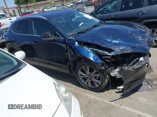 2023 Mazda CX-30 S Select with VIN 3MVDMBBM3PM514030, listed as a IAAI auction lot 42326959 with 41,226 mi miles and . Bid and sale history available at DreamBid. Image 13.