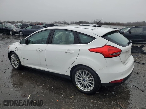 2016 Ford Focus Electric z VIN 1FADP3R42GL234563, wystawiony jako Copart lot #43955695 z przebiegiem 66 636 mil mil oraz Szkoda całkowita • Salvage title. Historia ofert i sprzedaży dostępna na DreamBid. Obrazek 2.