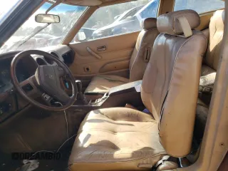 1981 Datsun 280ZX 2+2 z VIN JN1HZ06S6BX193317, wystawiony jako Copart lot #75494384 z przebiegiem 78 678 mil mil oraz Szkody całkowita. Historia ofert i sprzedaży dostępna na DreamBid. Obrazek 7.