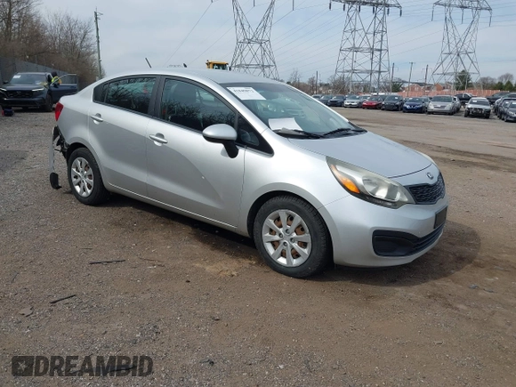 2013 Kia Rio LX with VIN KNADM4A36D6272803, listed as a IAAI auction lot 41849872 with 62,918 mi miles. Bid and sale history available at carsss.com. Image 1.