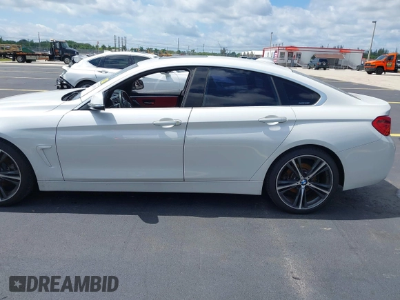 2018 BMW 4 Series 430i with VIN WBA4J1C5XJBG78451, listed as a IAAI auction lot 42256036 with 103,289 mi miles and . Bid and sale history available at DreamBid. Image 15.