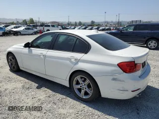 2014 BMW 3 Series 328i with VIN WBA3C1C58EK115651, listed as a Copart auction lot 59307425 with 65,902 mi miles and Salvage title. Bid and sale history available at DreamBid. Image 2.