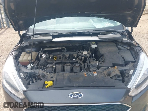 2018 Ford Focus SE with VIN 1FADP3F29JL288761, listed as a IAAI auction lot 42290510 with 93,463 mi miles and . Bid and sale history available at DreamBid. Image 10.