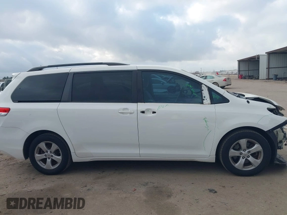 2014 Toyota Sienna LE AAS with VIN 5TDKK3DC6ES526159, listed as a IAAI auction lot 41522210 with 123,563 mi miles and . Bid and sale history available at DreamBid. Image 14.