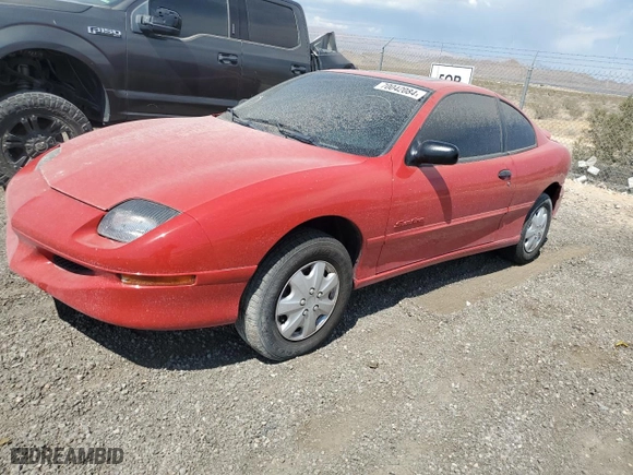 1998 Pontiac Sunfire SE with VIN 1G2JB1245W7571329, listed as a Copart auction lot 70042084 with 92,807 mi miles and Salvage Title. Bid and sale history available at carsss.com. Image 1.