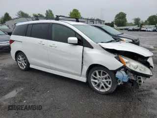 2012 Mazda 5 Touring z VIN JM1CW2CL8C0128309, wystawiony jako Copart lot #57406435 z przebiegiem 122 426 mil mil oraz Szkoda całkowita • Salvage title. Historia ofert i sprzedaży dostępna na DreamBid. Obrazek 4.