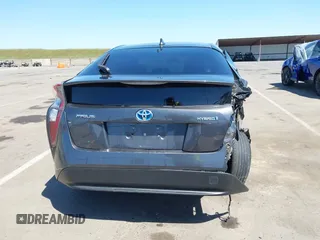 2016 Toyota Prius Two z VIN JTDKBRFU1G3521884, wystawiony jako IAAI lot #42081852 z przebiegiem 93 107 mil mil oraz . Historia ofert i sprzedaży dostępna na DreamBid. Obrazek 16.