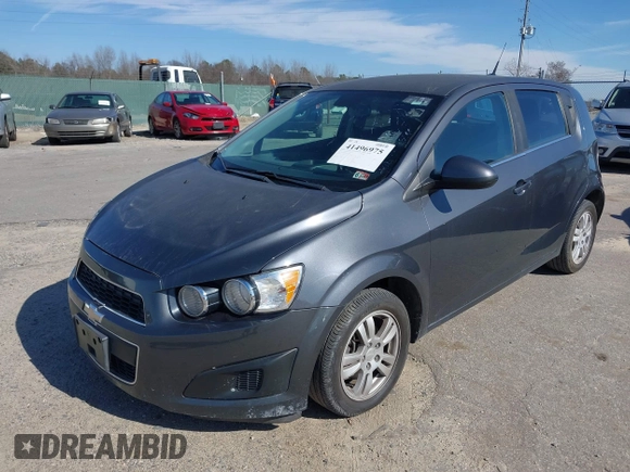 2013 Chevrolet Sonic LT with VIN 1G1JC6SB1D4164944, listed as a IAAI auction lot 41496975 with 96,987 mi miles. Bid and sale history available at carsss.com. Image 2.