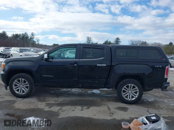2015 GMC Canyon 4WD SLT with VIN 1GTG6CE39F1238269, listed as a IAAI auction lot 41327897 with 155,663 mi miles. Bid and sale history available at carsss.com. Image 14.