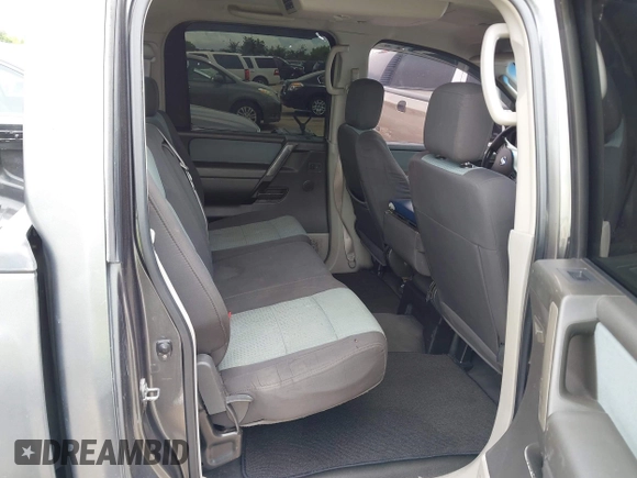 2004 Nissan Titan SE with VIN 1N6AA07AX4N590102, listed as a IAAI auction lot 42575732 with 307,316 mi miles and . Bid and sale history available at DreamBid. Image 8.