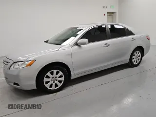 2009 Toyota Camry LE z VIN 4T1BK46K89U595880, wystawiony jako Copart lot #55069935 z przebiegiem 265 831 mil mil oraz Czysty tytuł • Clean title. Historia ofert i sprzedaży dostępna na DreamBid. Obrazek 1.